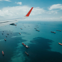 Shipping firms vow to cut emissions if governments support low-carbon tech